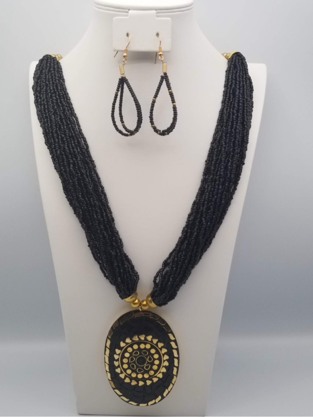 Black Beaded Statement Necklace with Gold Accent Pendant